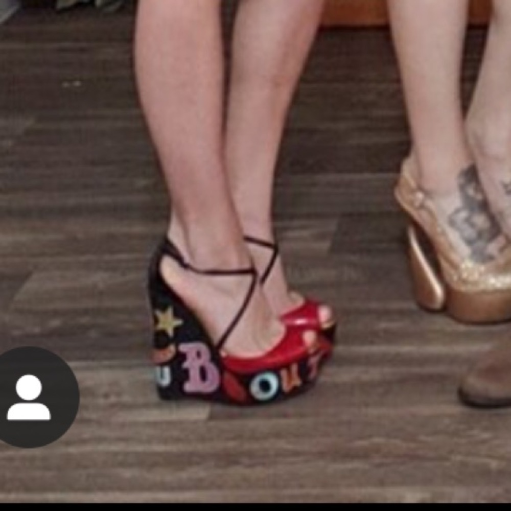 - *RARE** Christian Louboutin wedges